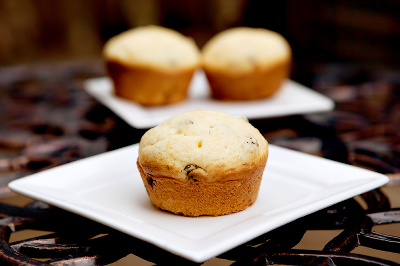 Muffins made with orange zest, currants, and sour cream.