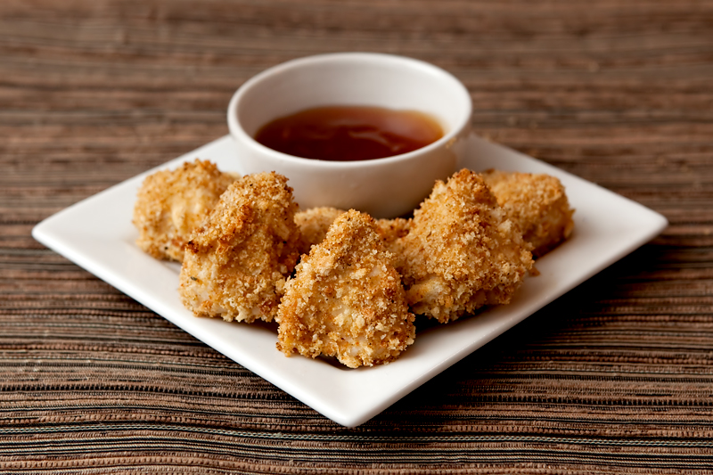 Homemade healthy chicken nuggets with a tangy sweet and sour sauce