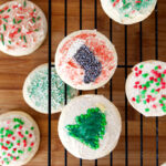 Christmas cookies! Soft, pillowy sugar cookies covered in vanilla bean frosting - reminiscent of Lofthouse cookies you find in the grocery store.