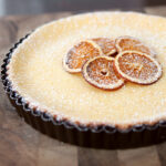 Chocolate Orange Ricotta Tart - a smooth citrusy tart made with soft ricotta and mascarpone on a bold chocolate shortbread crust.