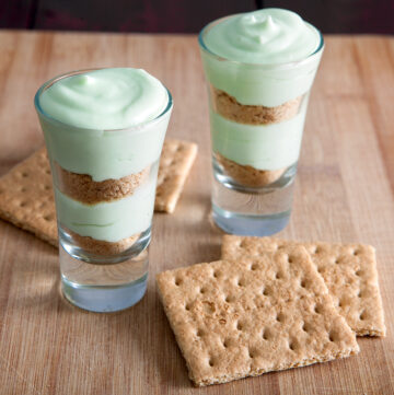 Shamrock Dessert shooters - refreshing, minty, and perfectly portioned. These would be perfect to serve after a heavy dinner when you just need a little something sweet instead of a heavy dessert.