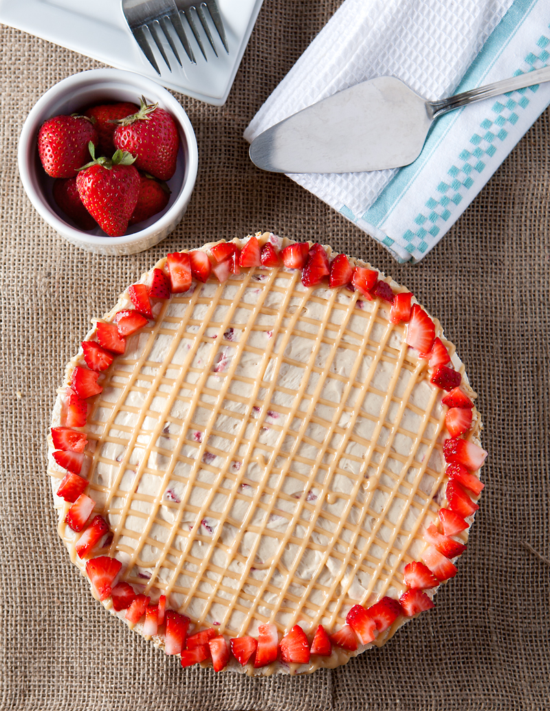 No Bake Peanut Butter Strawberry Fluff Pie is an easy summer treat. A salty crushed pretzel crust balances the sweetness and the addition of marshmallow creme makes each slice extra smooth and creamy. Awesome!