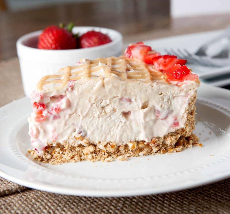 No Bake Peanut Butter Strawberry Fluff Pie is an easy summer treat.  A salty crushed pretzel crust balances the sweetness and the addition of marshmallow creme makes each slice extra smooth and creamy.  Awesome!