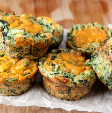 Super easy recipe for cheesy spinach mashed potato cups. Great way to use up leftover mashed potatoes. This dish even got my son to try spinach!