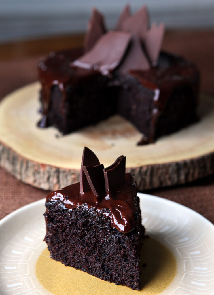 This impossibly moist and fudgy dark chocolate cake is baked with red wine and covered with a dark chocolate red wine ganache. It's scaled down to a cute 6-inch cake, so it's a perfect dessert for two!