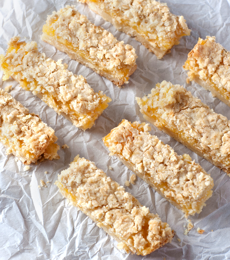 Lemon Oatmeal Crumble Bars - the filling is strong and tart and the crust is soft yet sturdy.  The whole thing is finished off with a crunchy crumbly oatmeal topping.  These were a hit with everyone I gave them to!!