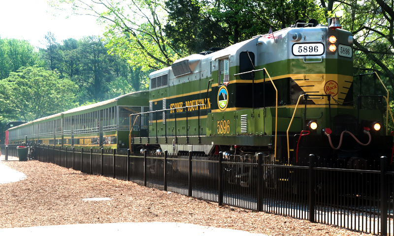 What To Do At Stone Mountain Park review - our day at the park with our toddler and baby riding the train, seeing the dinosaurs, and enjoying the sunshine.