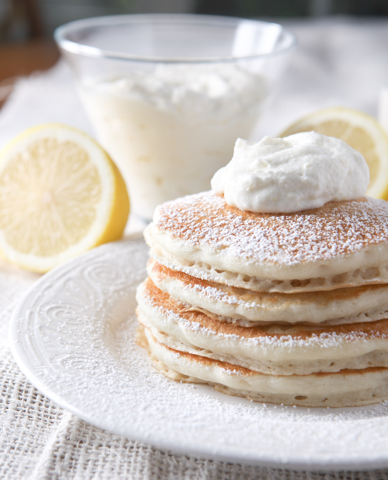 Lemon Ricotta Pancake Topping made from citrus-infused whipped cream - SO GOOD!