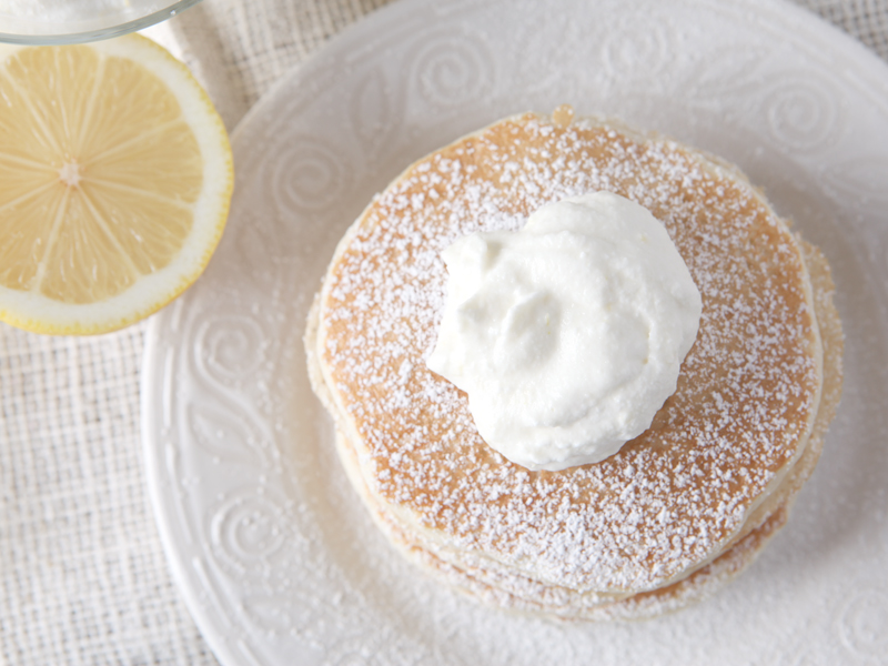 Lemon Ricotta Pancake Topping made from citrus-infused whipped cream - SO GOOD!