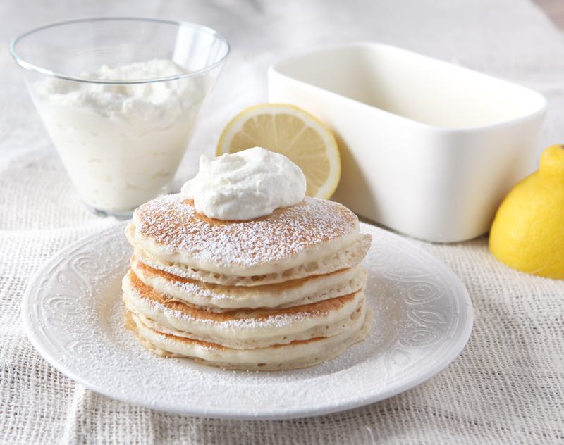 Lemon Ricotta Pancake Topping made from citrus-infused whipped cream - SO GOOD!