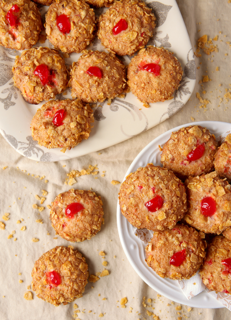 Old Fashioned Cherry Winks cookies rolled in crushed Corn Flakes!  There's something so cozy about vintage recipes!