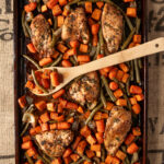 Sheet pan dinner idea - balsamic herb chicken and vegetables with fresh green beans, sweet potatoes, carrots, and onions