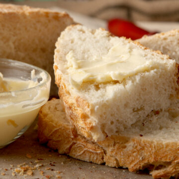 An easy no knead homemade bread with a crunchy crust and creamy homemade butter!