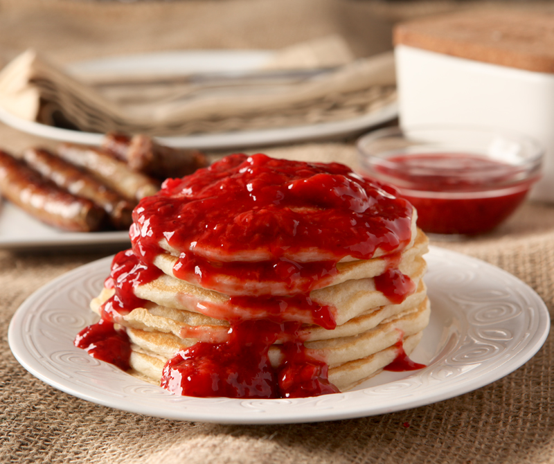 How to make an easy strawberry orange sauce for pancake topping! Would also be delicious over ice cream, waffles, or French toast!