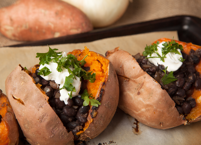 An easy and nutritious dinner idea - black bean stuffed sweet potatoes with onions and lots of flavor.