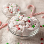 White chocolate coated rice chex cereal mixed with mini M&M's, crushed peppermint and dusted with powdered sugar. An easy Christmas snack mix!