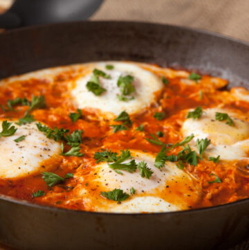 Quick and easy dinner idea - eggs in purgatory using spicy spaghetti sauce - ready in just 10 minutes!