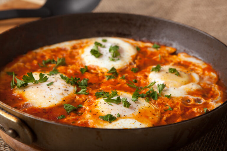 Quick and easy dinner idea - eggs in purgatory using spicy spaghetti sauce - ready in just 10 minutes!