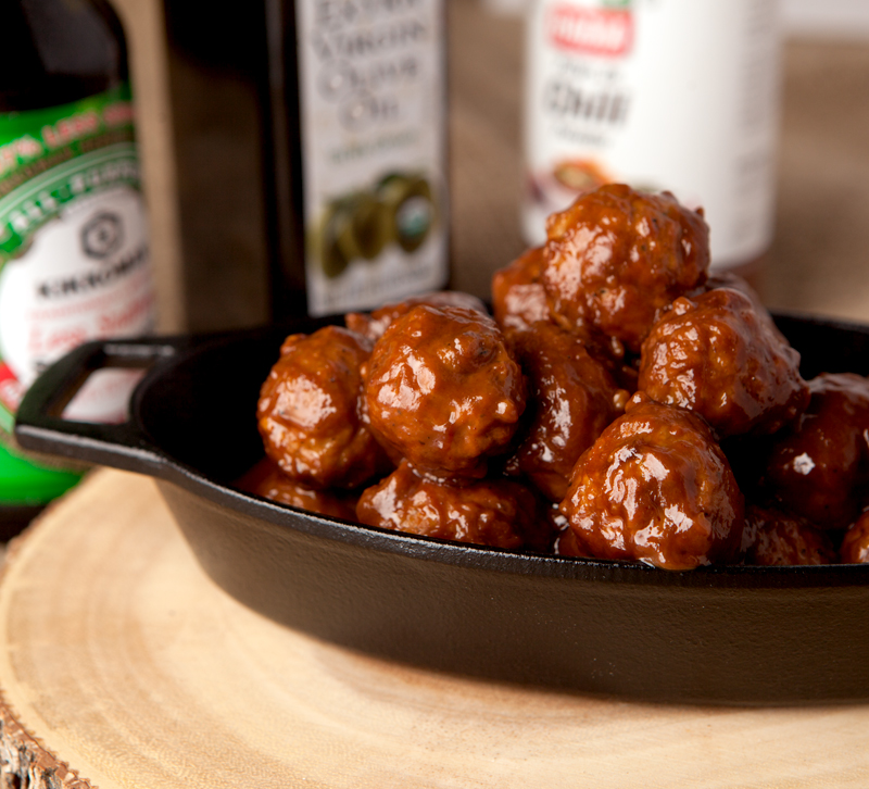 Easy shortcut Asian style garlic sesame turkey meatballs that are out of this world!  The sauce is just the right mix of tangy and peanut buttery.  Double or triple the recipe to feed a crowd!