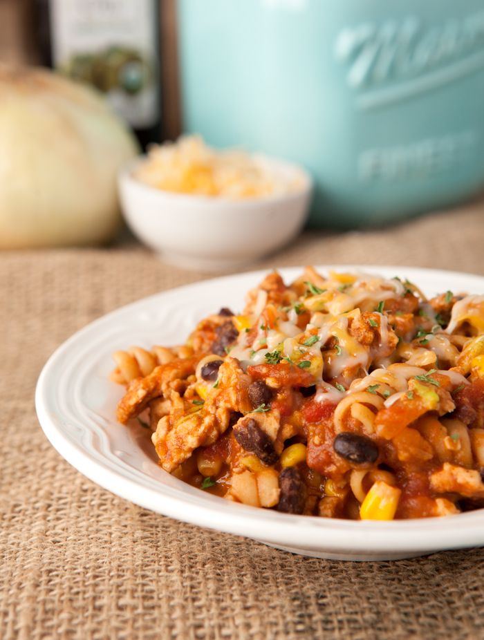 This easy one pot ground turkey taco pasta is full of flavors from tomato sauce, black beans, corn, and even avocado! Lots of complex carb goodness going on from the whole wheat pasta.