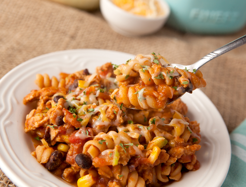 This easy one pot ground turkey taco pasta is full of flavors from tomato sauce, black beans, corn, and even avocado! Lots of complex carb goodness going on from the whole wheat pasta.