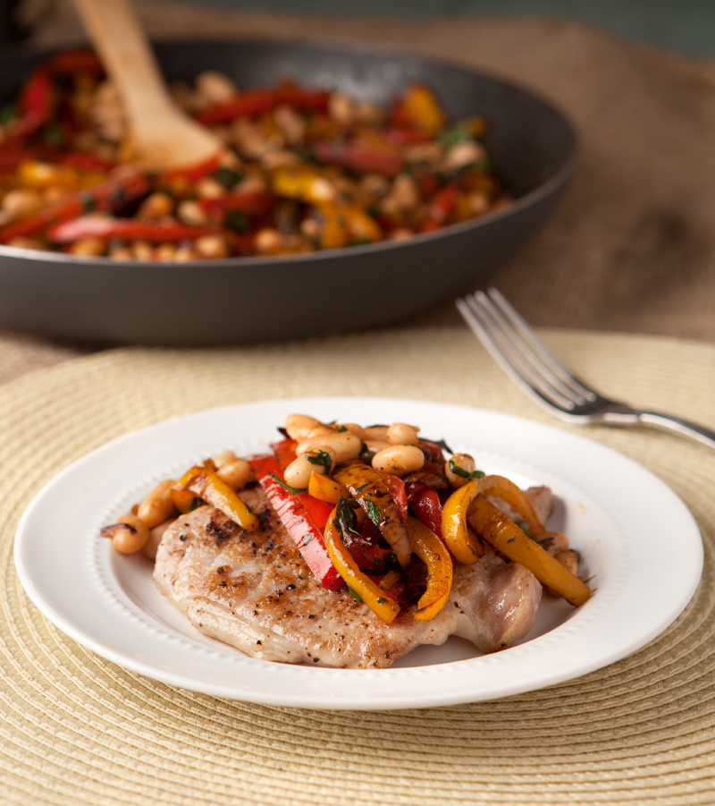 These pork cutlets with sauteed bell peppers and white beans and an easy dinner idea! Low carb and incredibly simple.