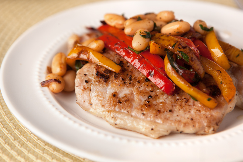 These pork cutlets with sauteed bell peppers and white beans and an easy dinner idea! Low carb and incredibly simple.