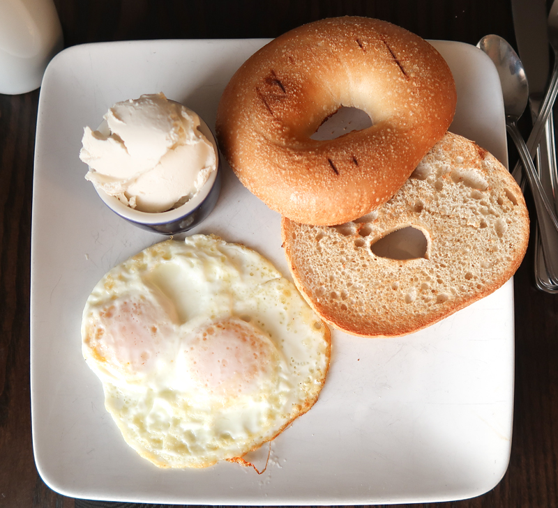 Eggs with cream cheese and a toasted bagel at Aviles Restaurant in St. Augustine