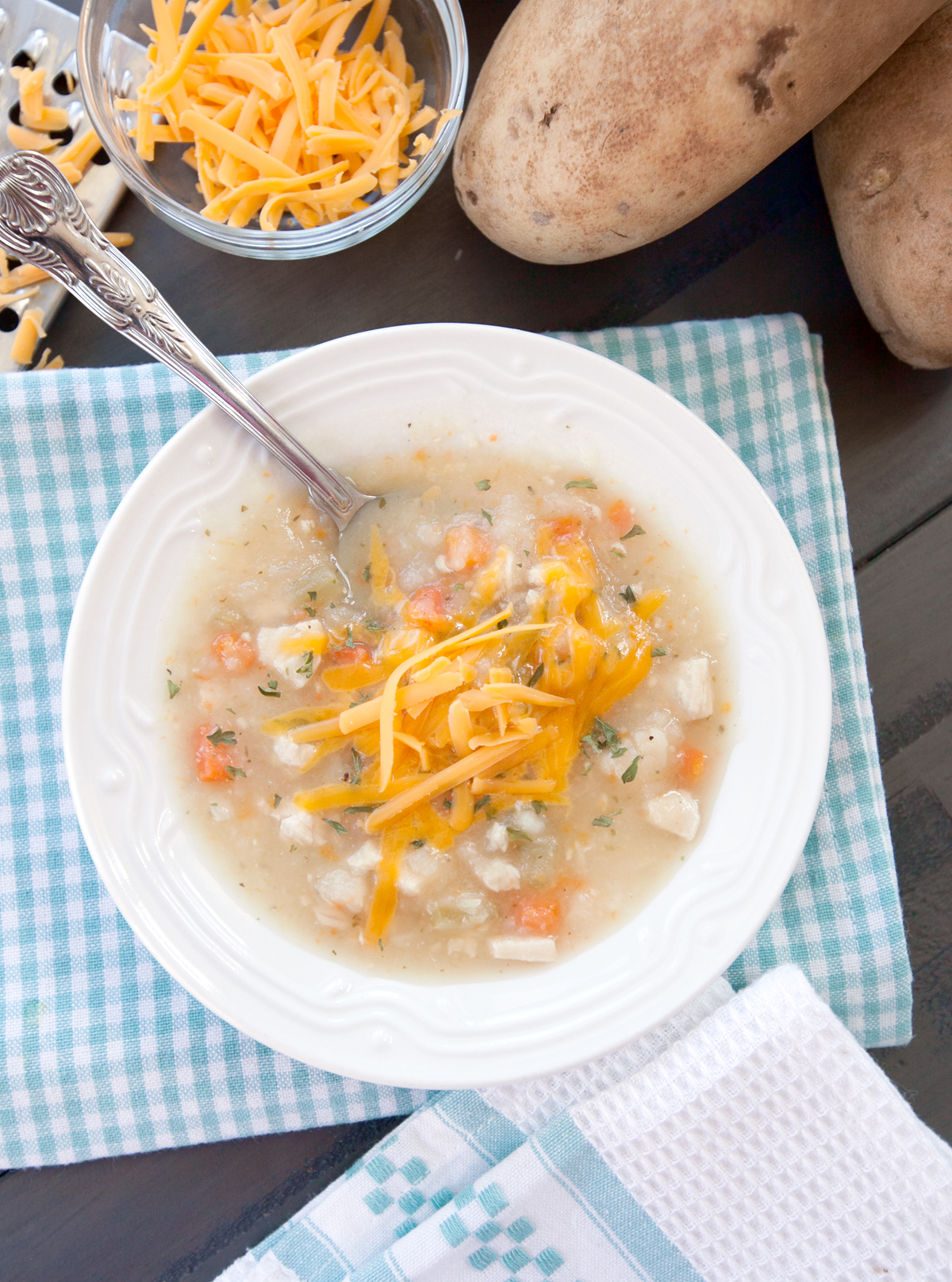 Overhead view of a bowl of chicken potato soup