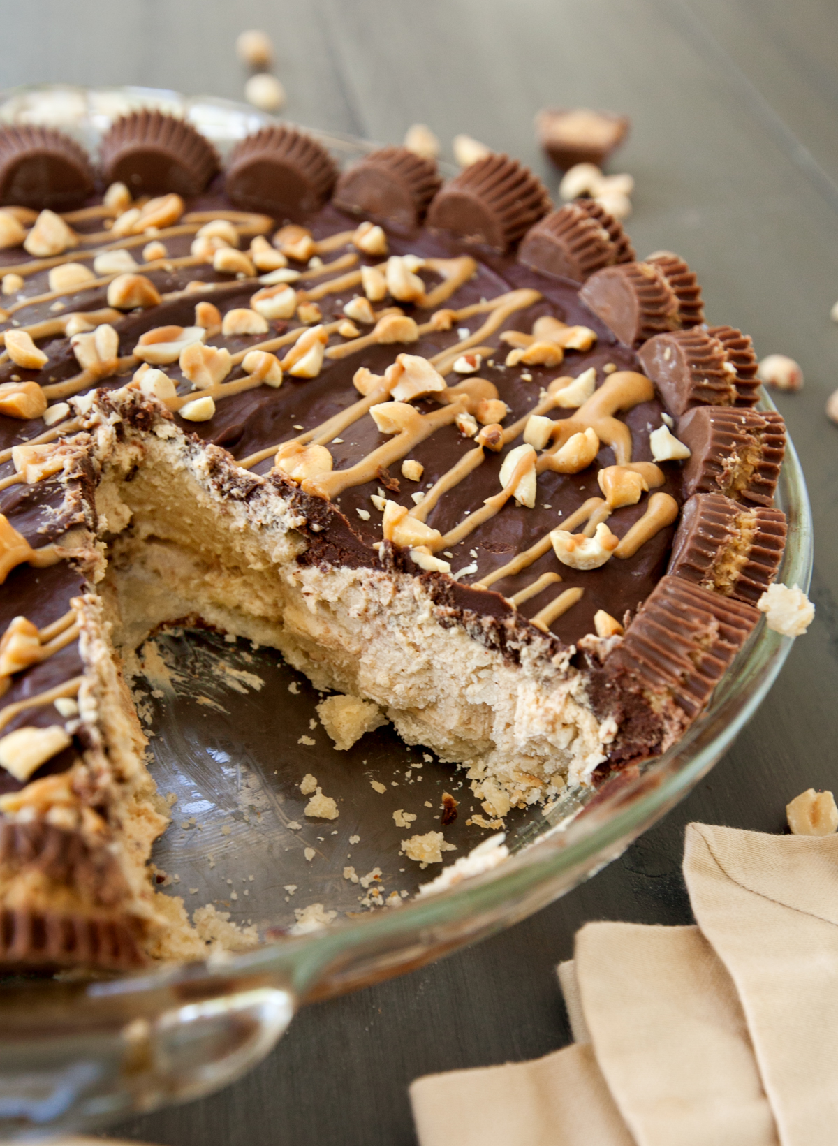 chocolate peanut butter pie with slice taken out