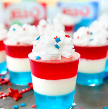 patriotic jello shots with whipped cream and sprinkles