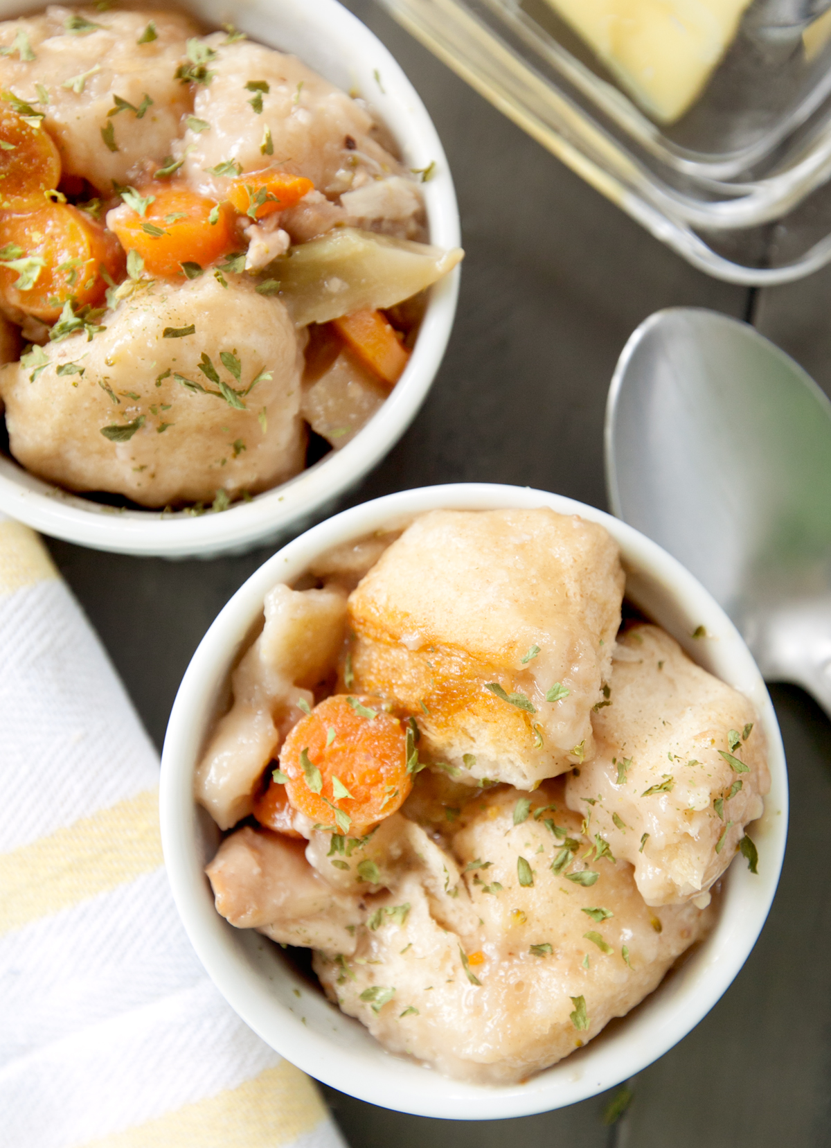 overhead flat lay of crock pot chicken and biscuits