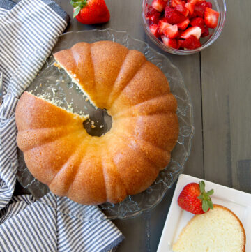 overhead of sour cream pound cake with a slice cut out