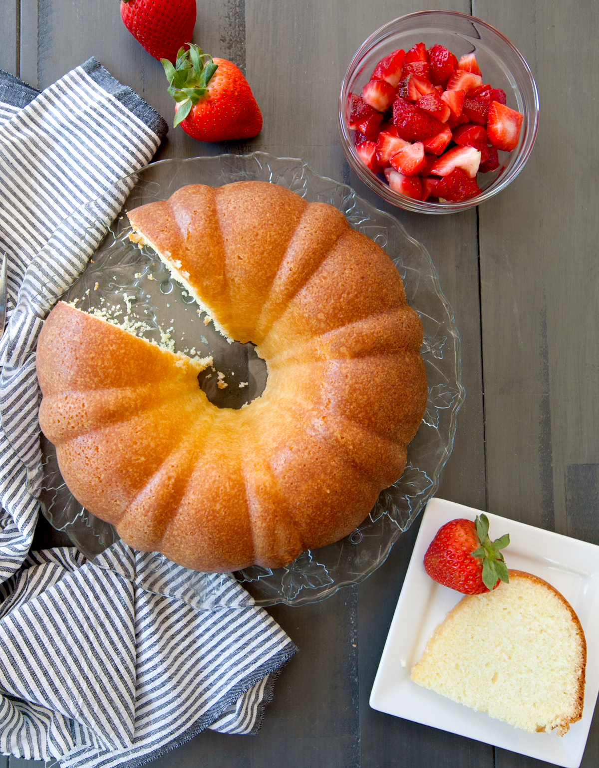 overhead of sour cream pound cake with a slice cut out