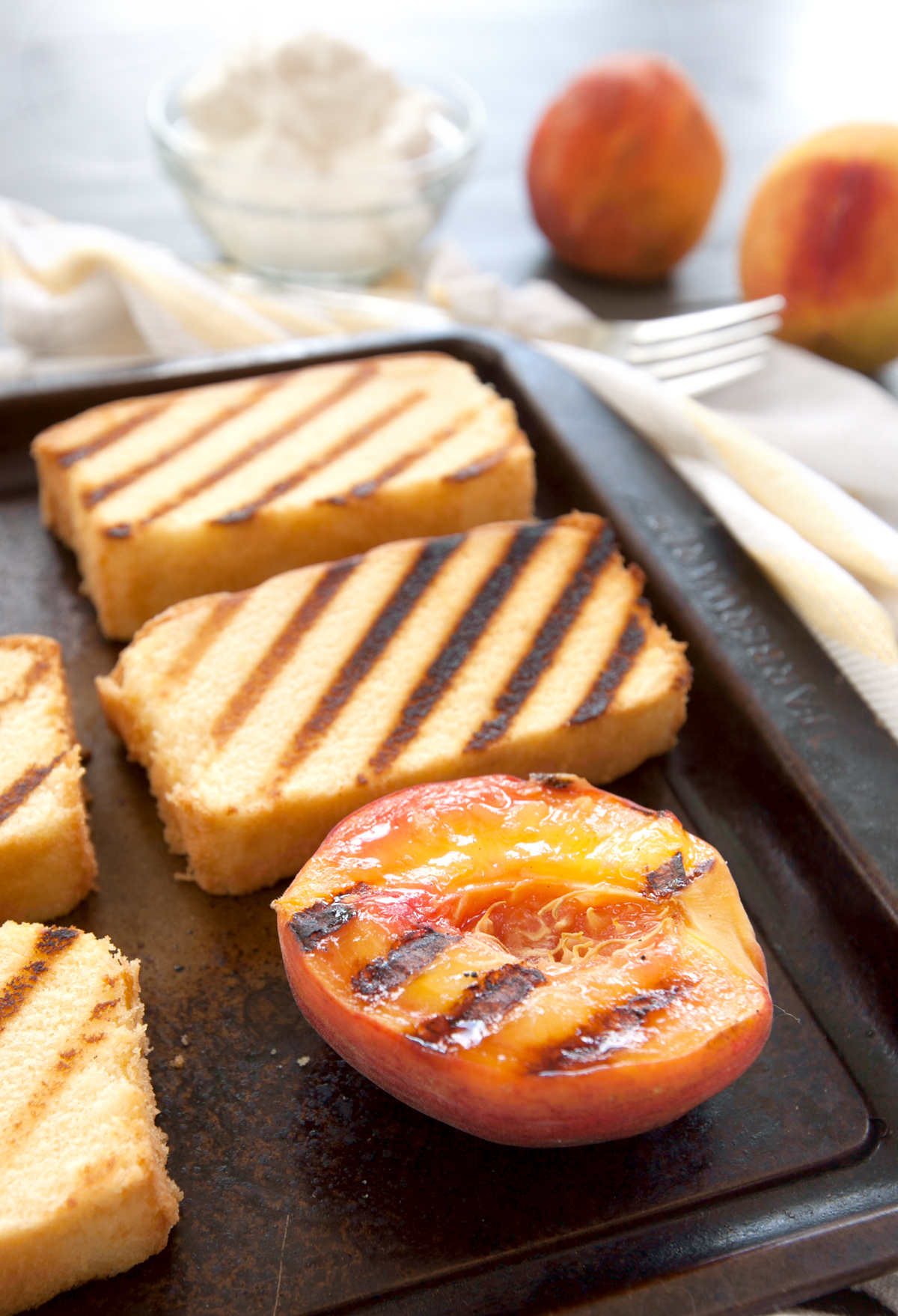 close up of slices of grilled pound cake and peaches with delicious grill marks