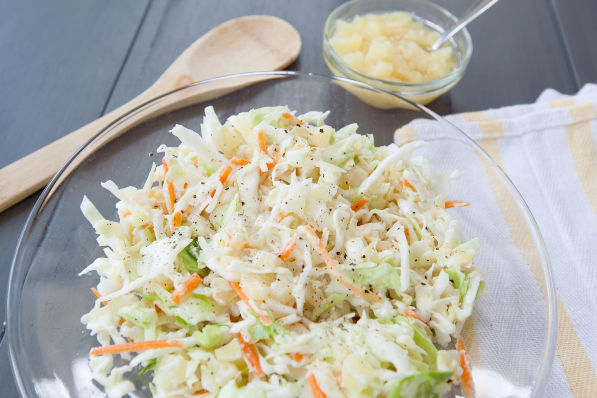 a glass dish of hawaiian coleslaw