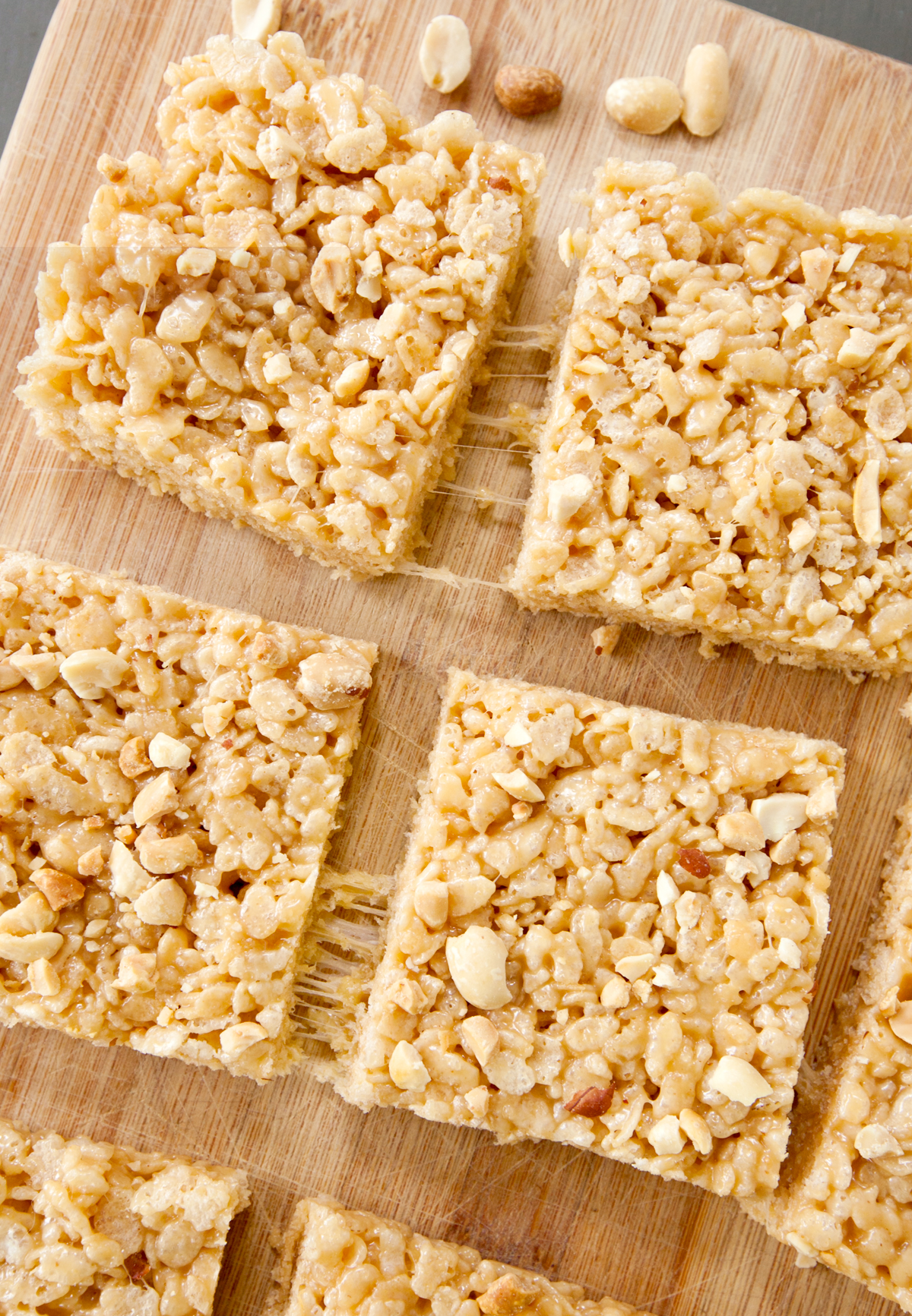 An overhead view of peanut butter rice krispie bars with stringy marshmallow