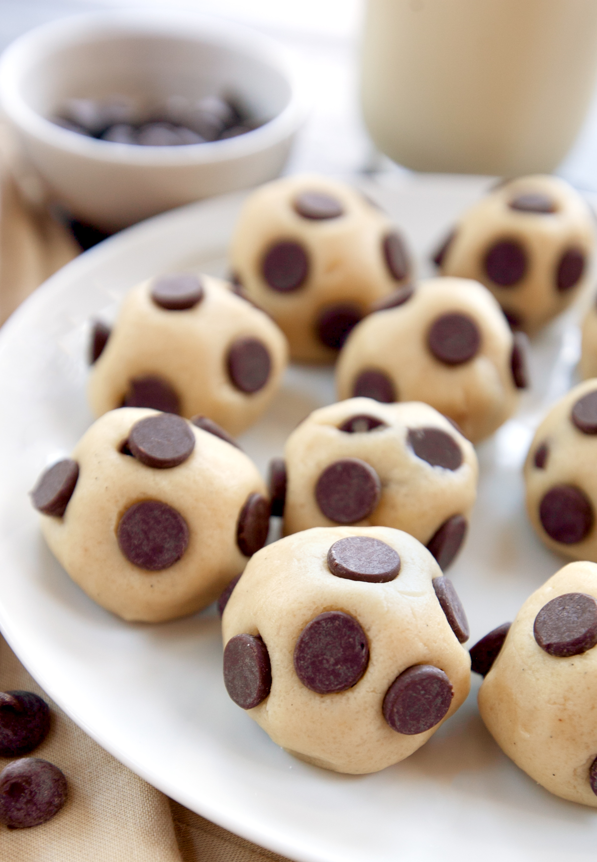 A plate of cookie dough bites stuffed with chocolate chips