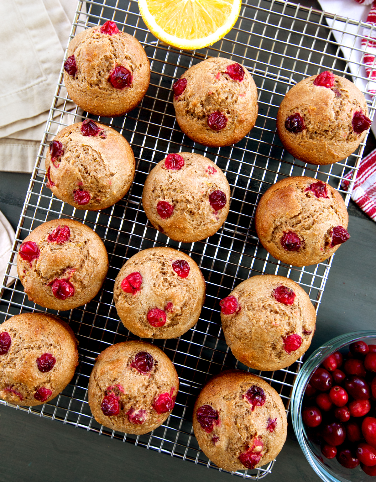 An overhead view of fresh baked healthy cranberry orange muffins