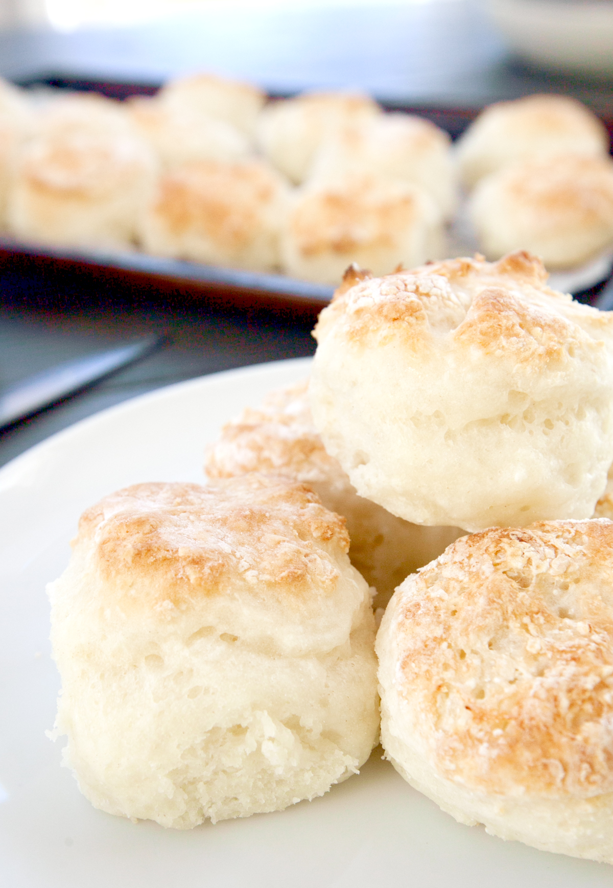 A pile of fluffy low calorie biscuits with golden tops