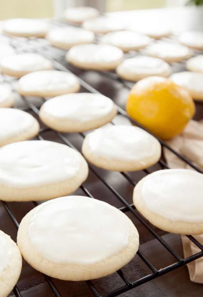 Cooling racks lined with rows of Ham and Goodys lemon cookies copycats.