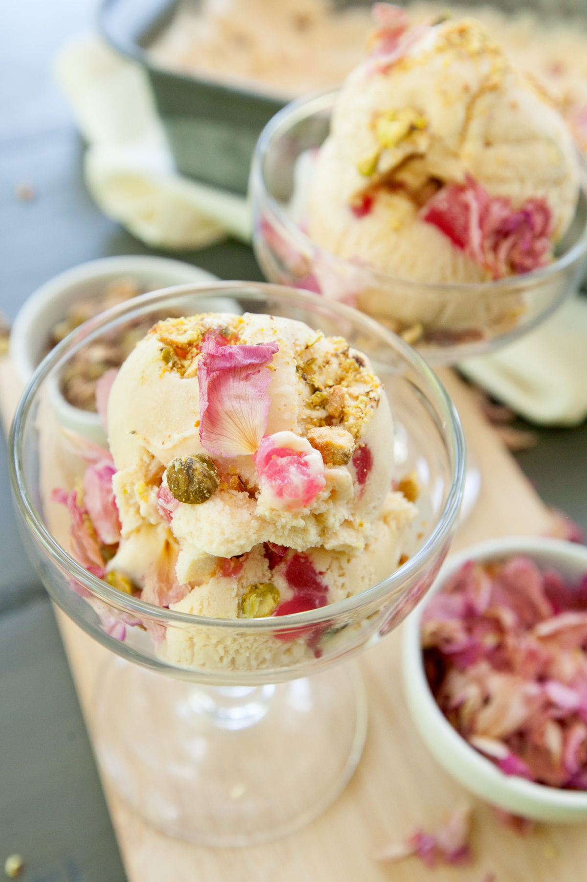 Pistachio rose ice cream dotted with Turkish Delight scooped into lovely glassware.