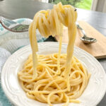 a forkful of buttery noodles.