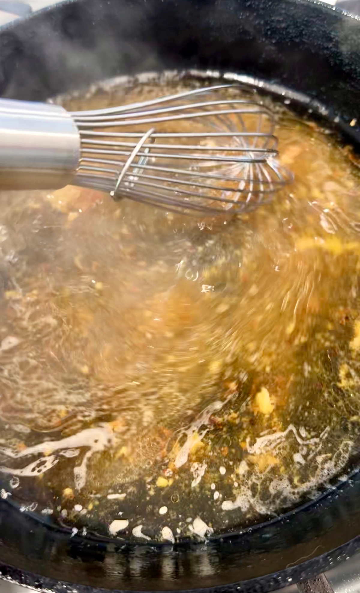 whisking up an apple cider glaze.